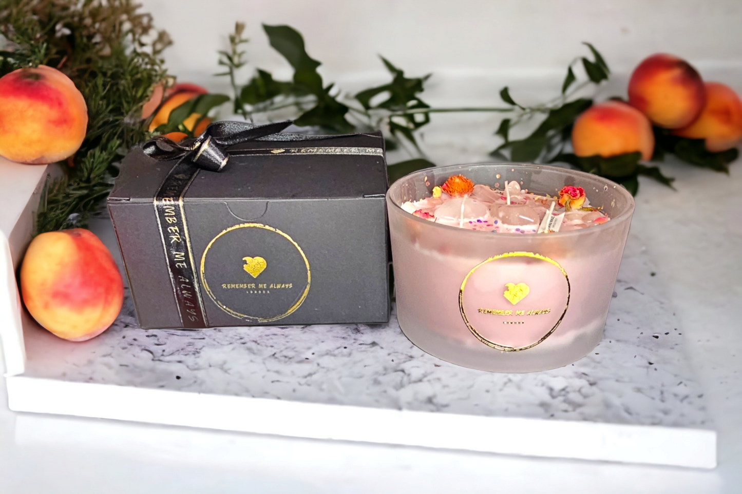 3 wick scented 50cl pale pink soy candle, in a frosted glass container, with dried flowers and crystals embedded into it. Comes in a beautiful gift box and ribbon. 